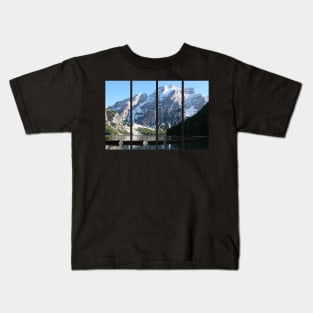 The fabulous alpine lake of Braies in the Dolomites (Bolzano). Lovely place in the Italian Alps. Boats on the water. Reflections in the water. Sunny spring day. Trentino Alto Adige Kids T-Shirt